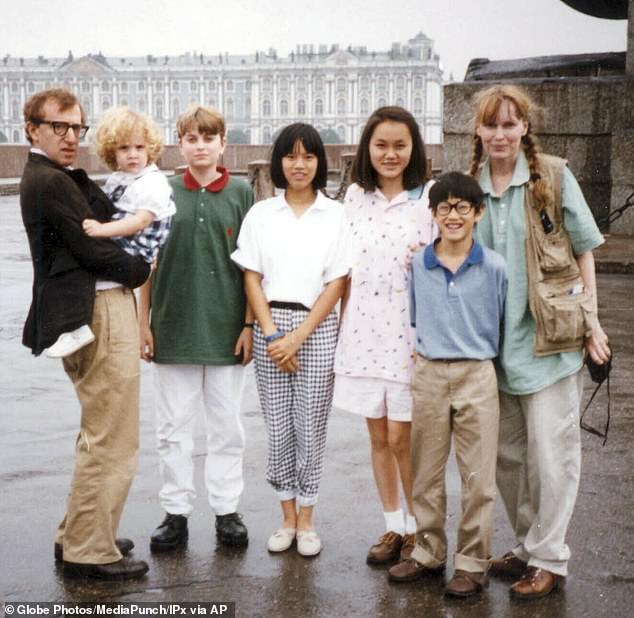 Farrow naturally felt betrayed when it emerged in January 1992 that Woody (left) had been secretly having an affair with her 21-year-old adopted daughter, Soon-Yi Previn (third from right), and seven months later, she publicly accused Woody of sexually abusing her 7-year-old adopted daughter, Dylan Farrow.